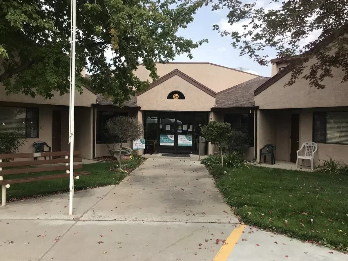 The front entrance and walkway of Madison House Assisted Living at 120 S Madison St in Cortez, Colorado